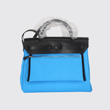 Herbag 31 in Bleu Riviera/Noir